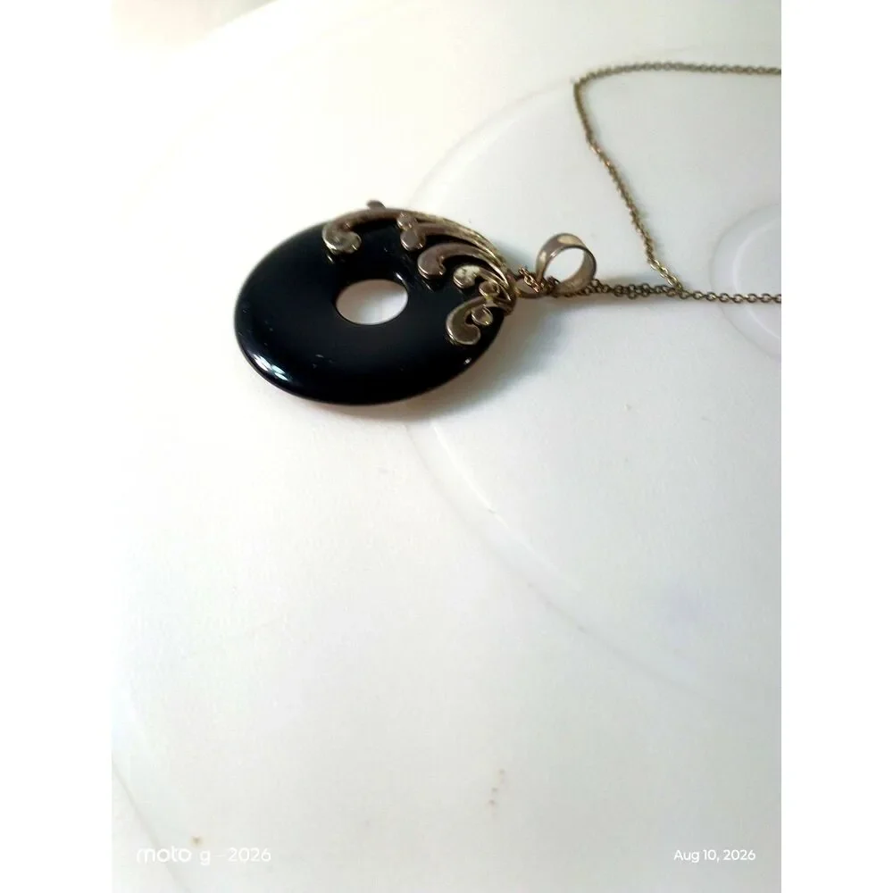 Black Donut Pendant Necklace in Wire-Wrapped Silver & Gold Motif